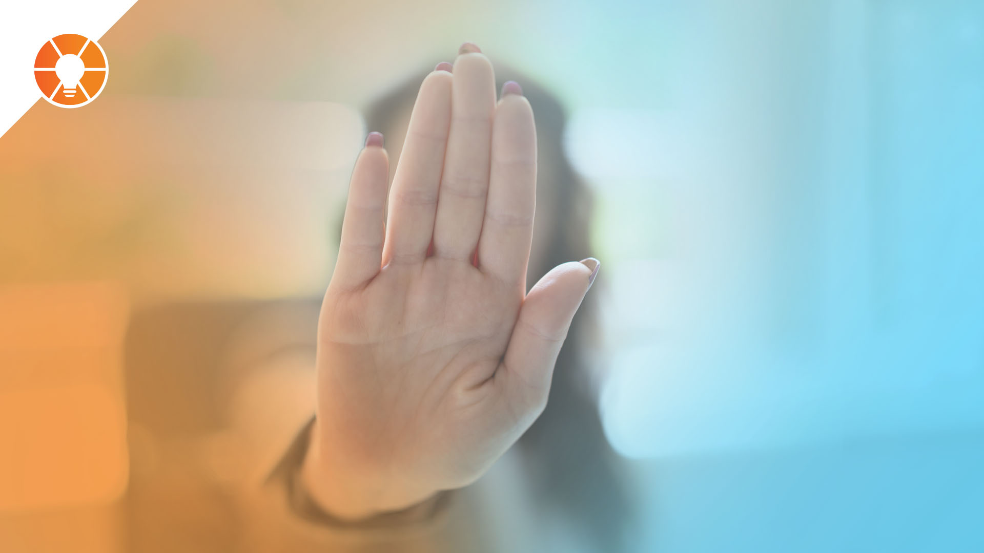 Person holding up a hand in a “stop” gesture, symbolizing pausing business growth to focus on refining existing processes rather than adding more.