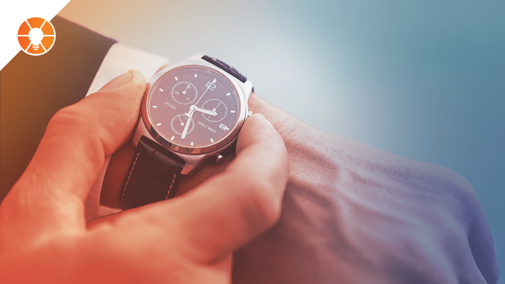A business leader checking their watch