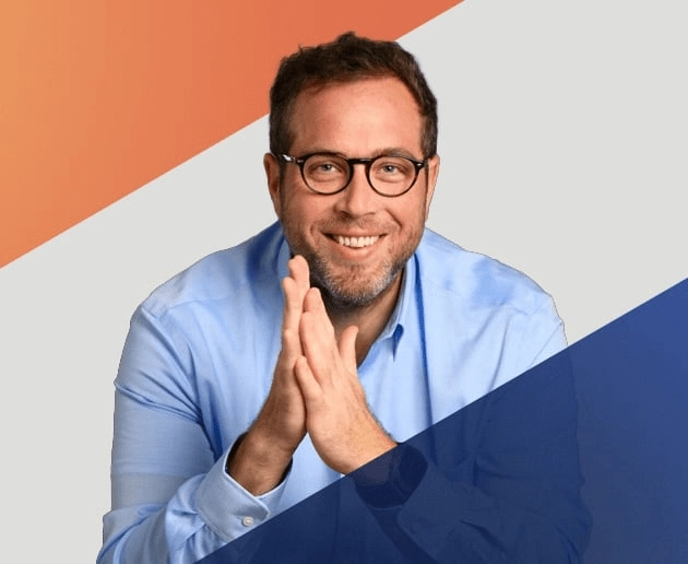 Clay Harris headshot with orange and blue EOS Worldwide branding