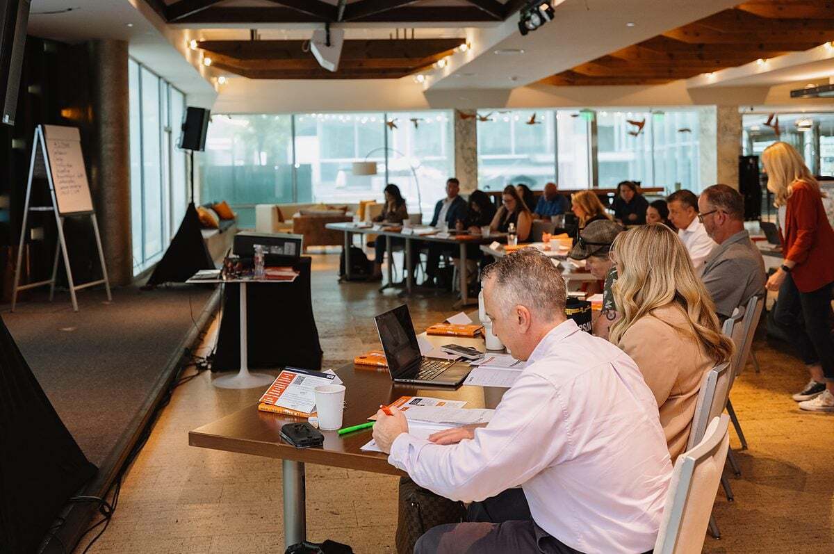 Attendees working through the EOS tools at a workshop