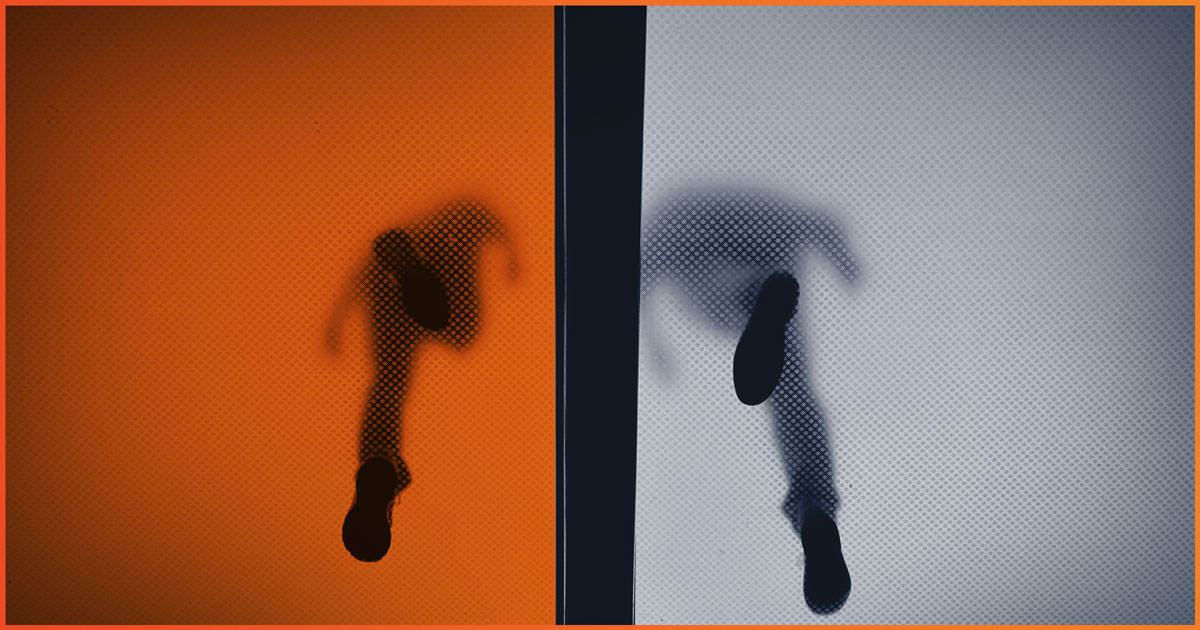 Two people walking on glass