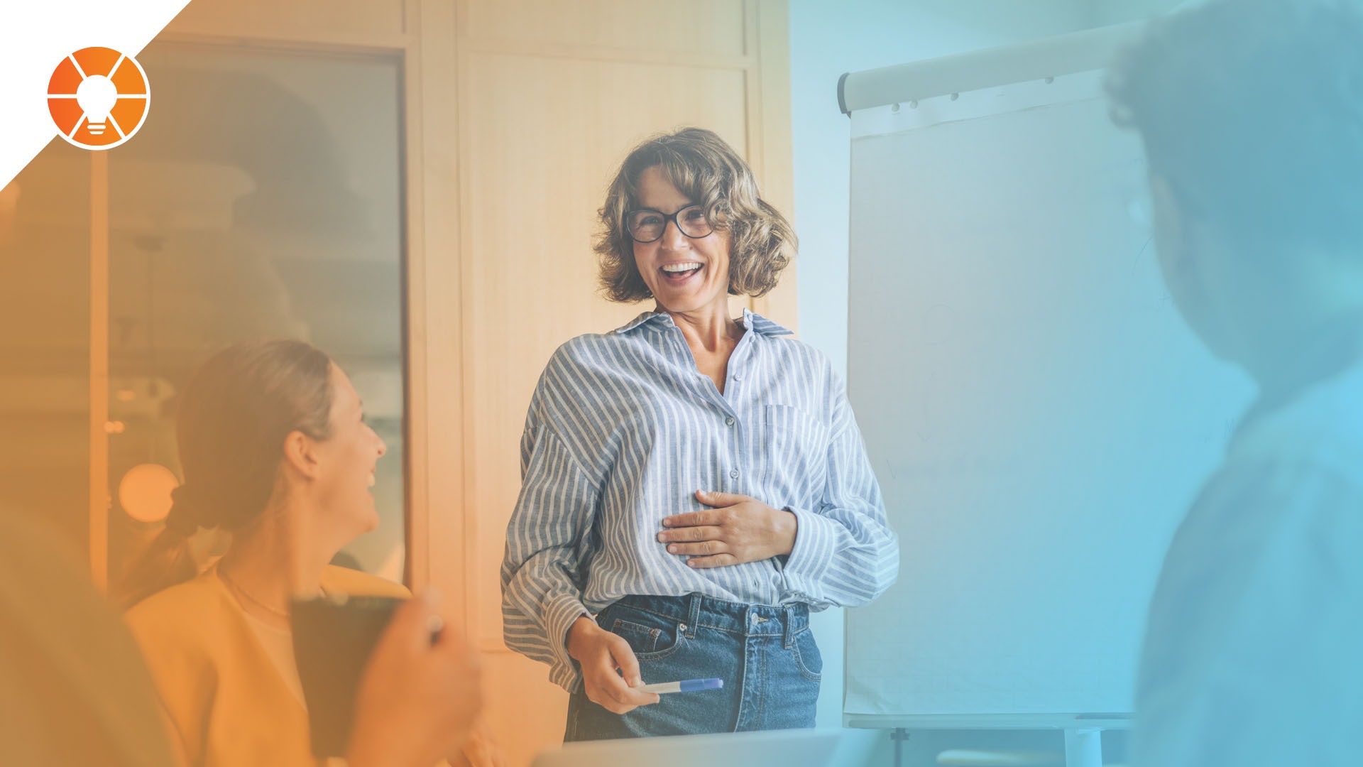 An EOS implementer enjoys a discussion with an EOS business leader in a yearly meeting