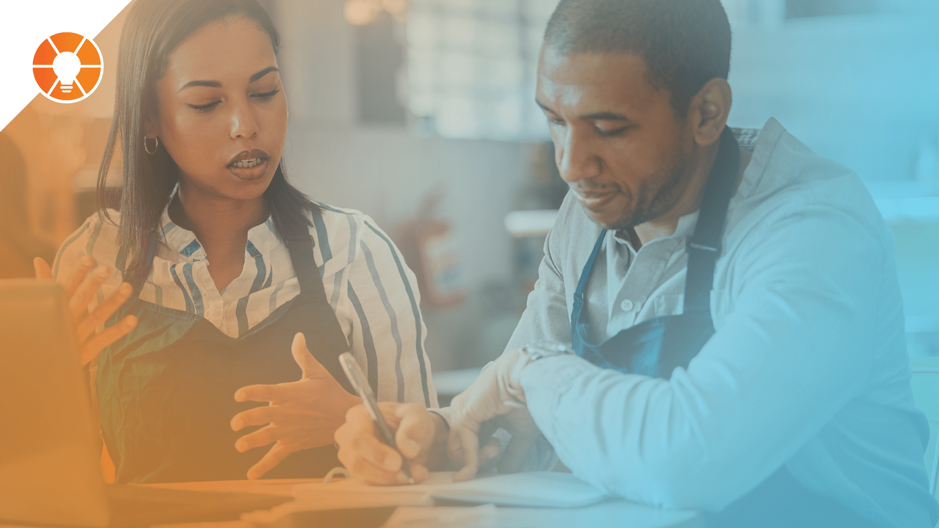 Team members discuss business in a weekly Level 10 Meeting.