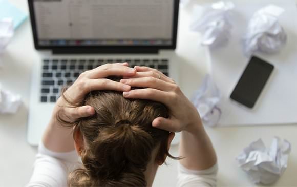 Woman with her head down