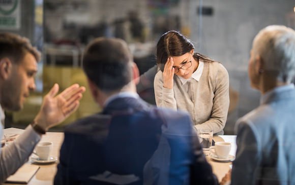Frustrated woman in meeting
