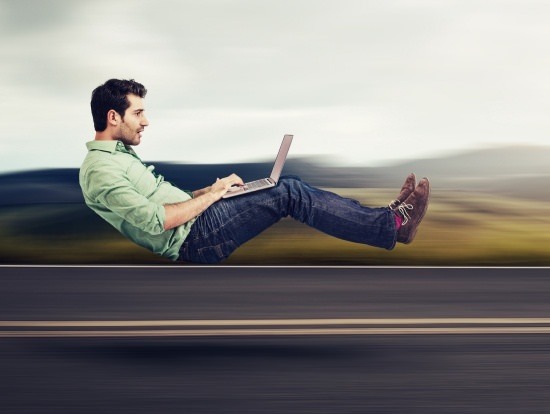 Is your business on autopilot? Man speeding in invisible car while working on laptop 