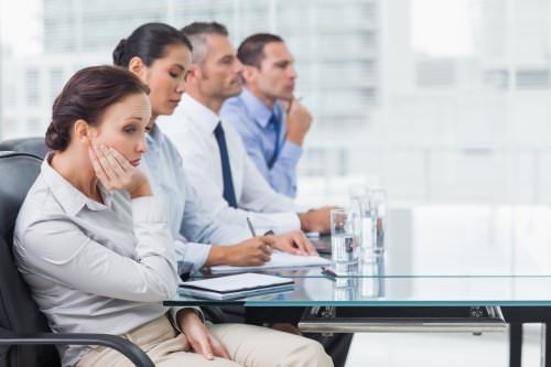 unengaged employees in a boring company meeting