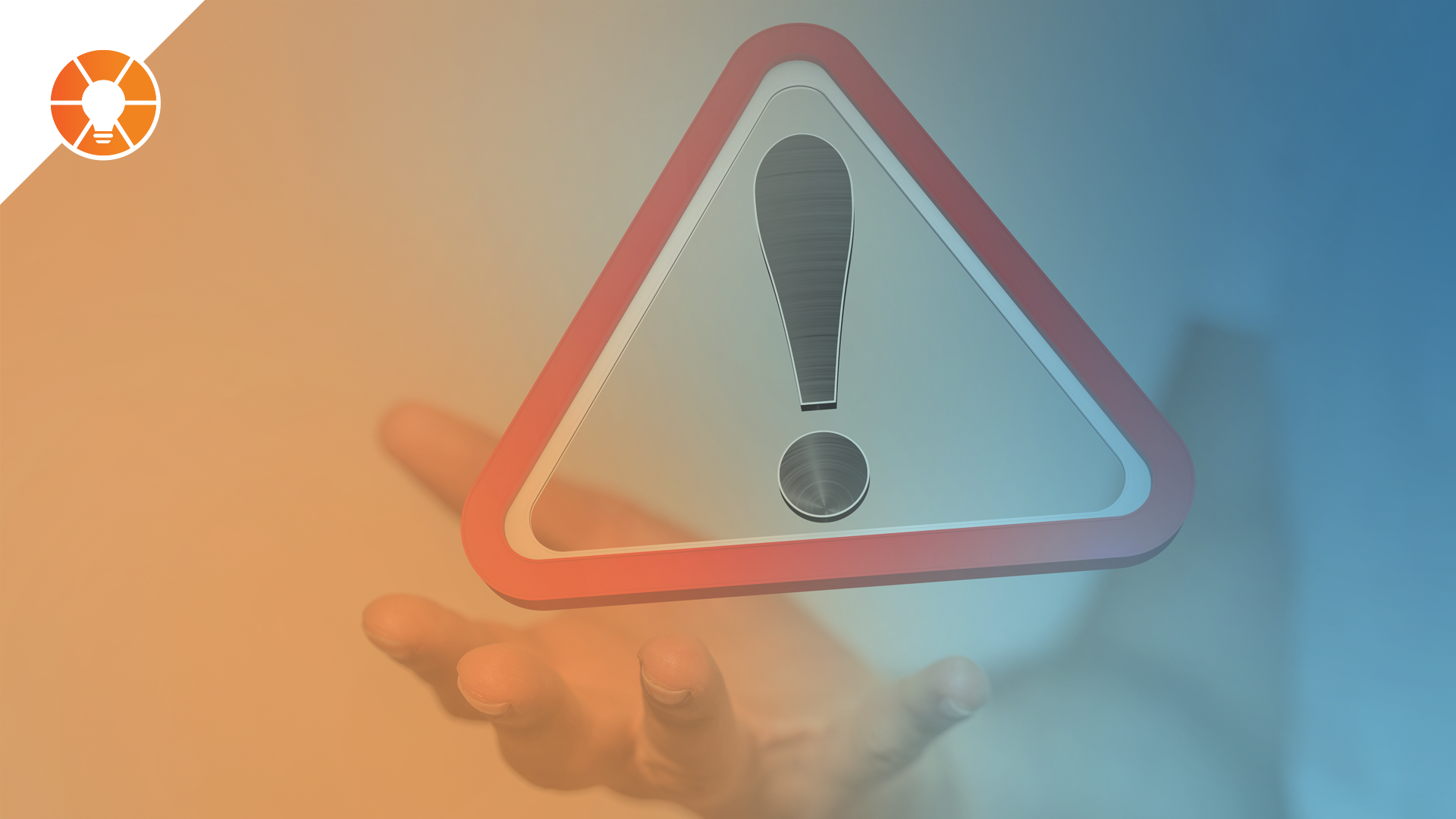 A person holds out a warning sign in an open hand