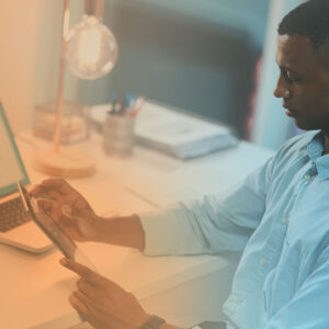 A business leader reviews data in the EOS Scorecard