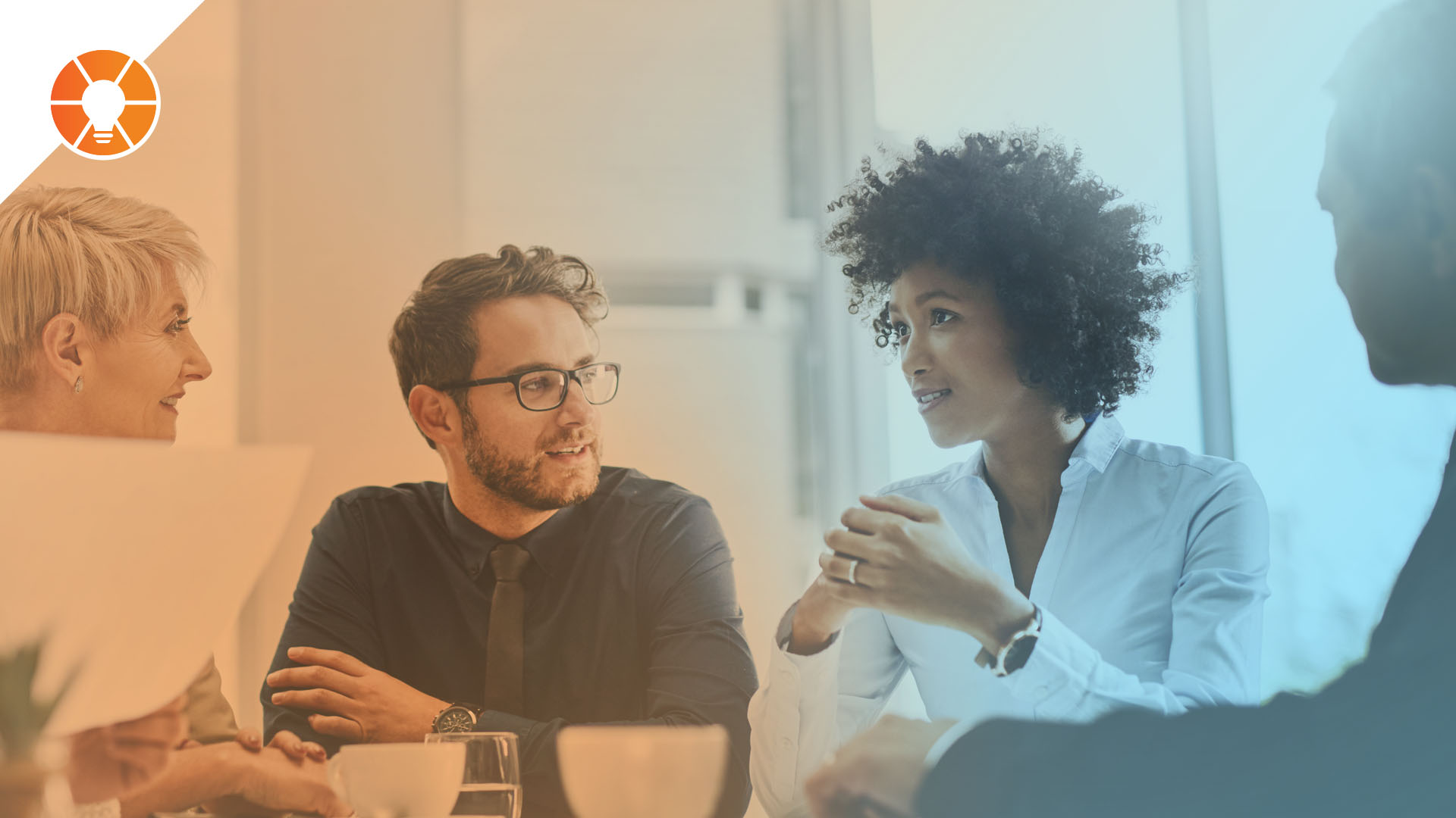 Group of people having a meeting at a conference table