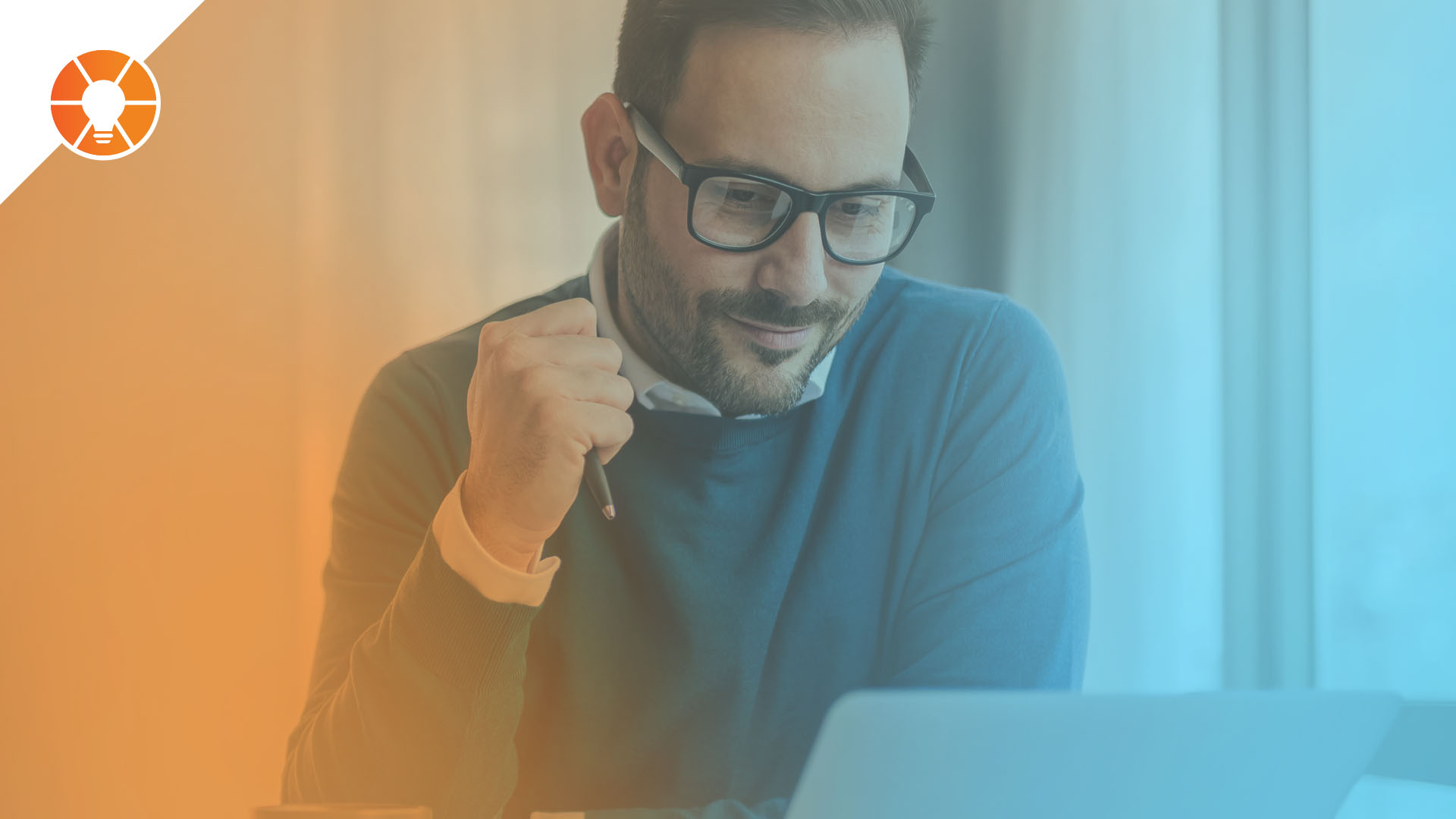 An entrepreneur analyzes data on a laptop