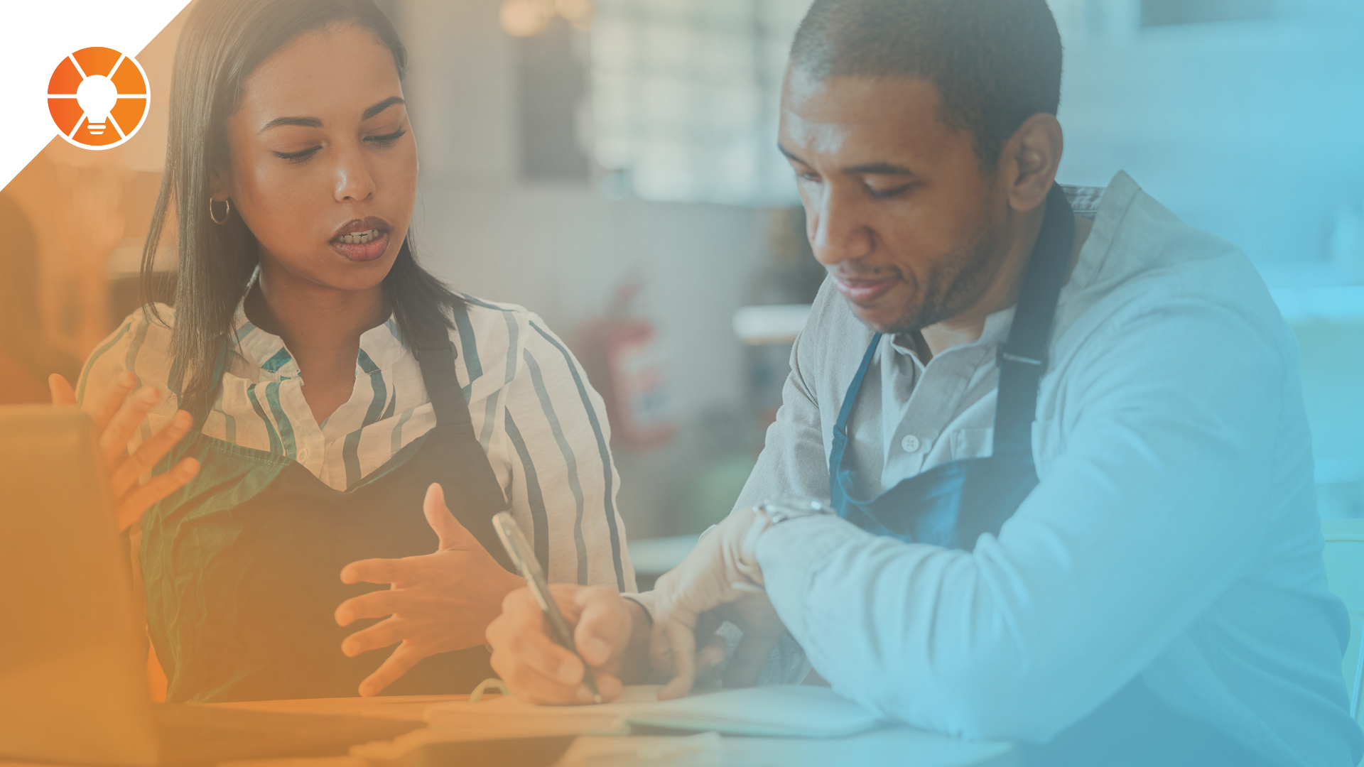 Team members discuss business in a weekly Level 10 Meeting.
