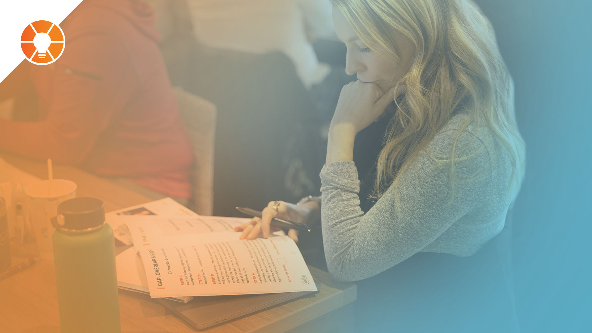 An entrepreneur reads an EOS book