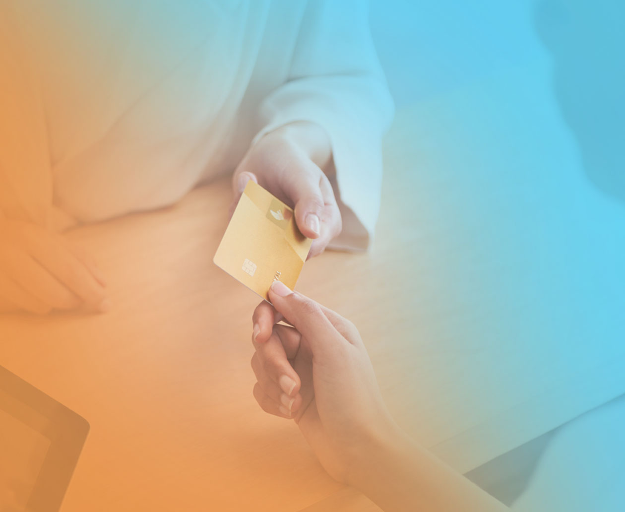 An ideal client passes a credit card to an entrepreneur running on EOS